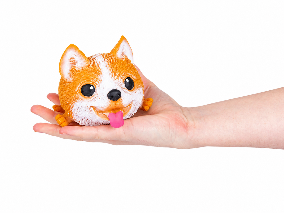 Squish & Stretch Puffy Dog squishy toy resting in an open hand