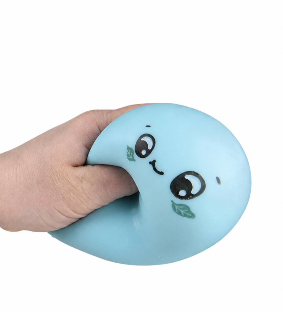 Blue Squish & Stretch Dumpling sensory toy being squeezed by hand