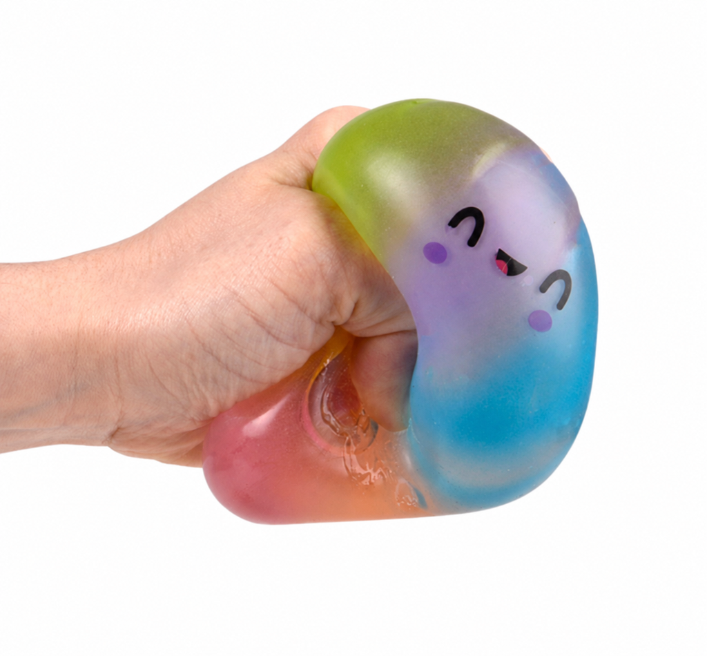 Sugar Squeezy Rainbow Dumpling being squeezed by hand